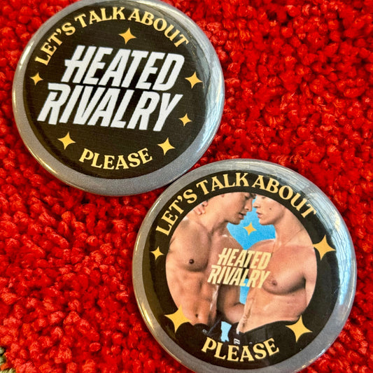 Two buttons with text 'Let's talk about heated rivalry please' on a red textured background