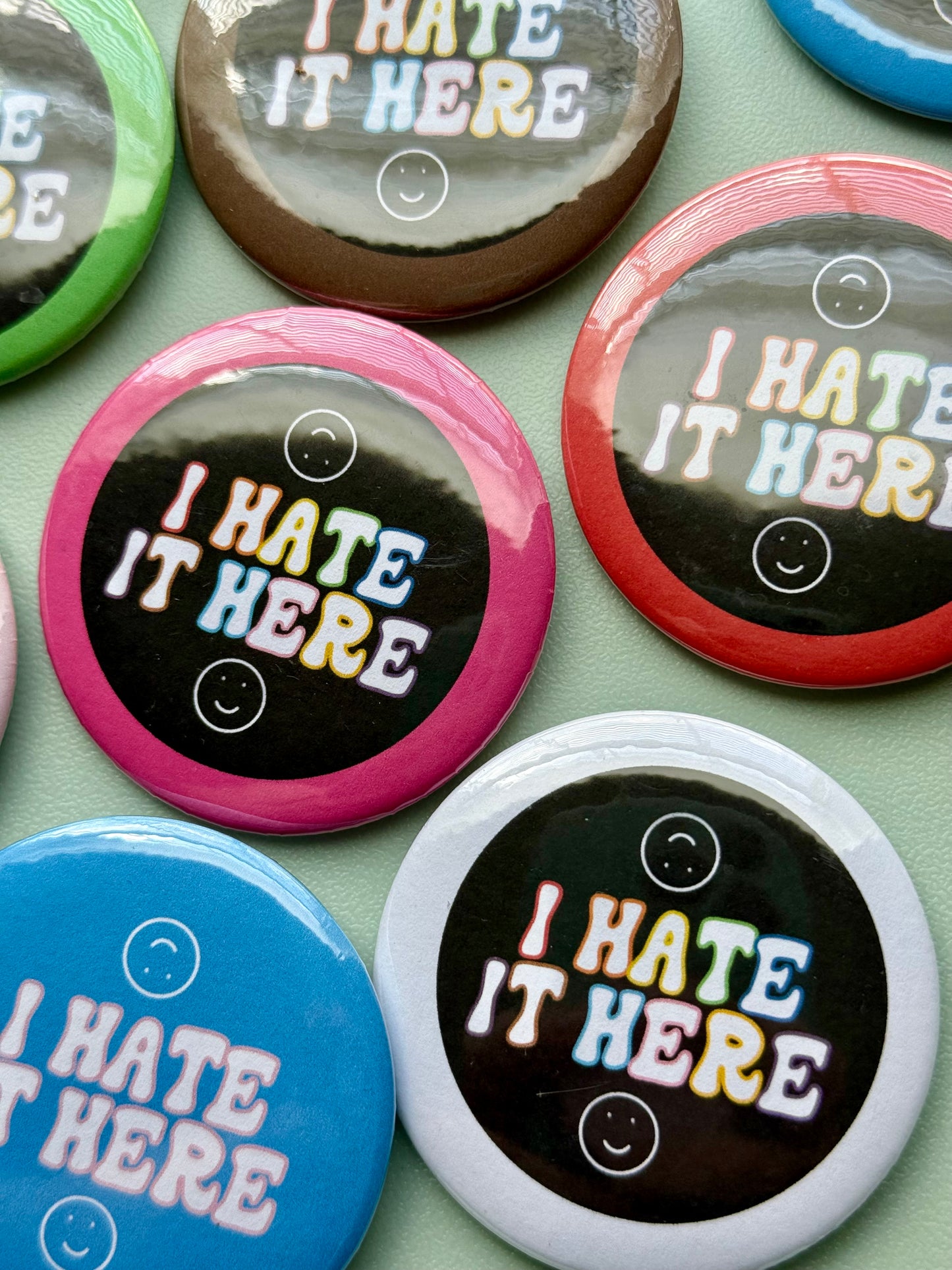 I Hate It Here LGBTQIA+ Pride Flag Colors 2.25" Button
